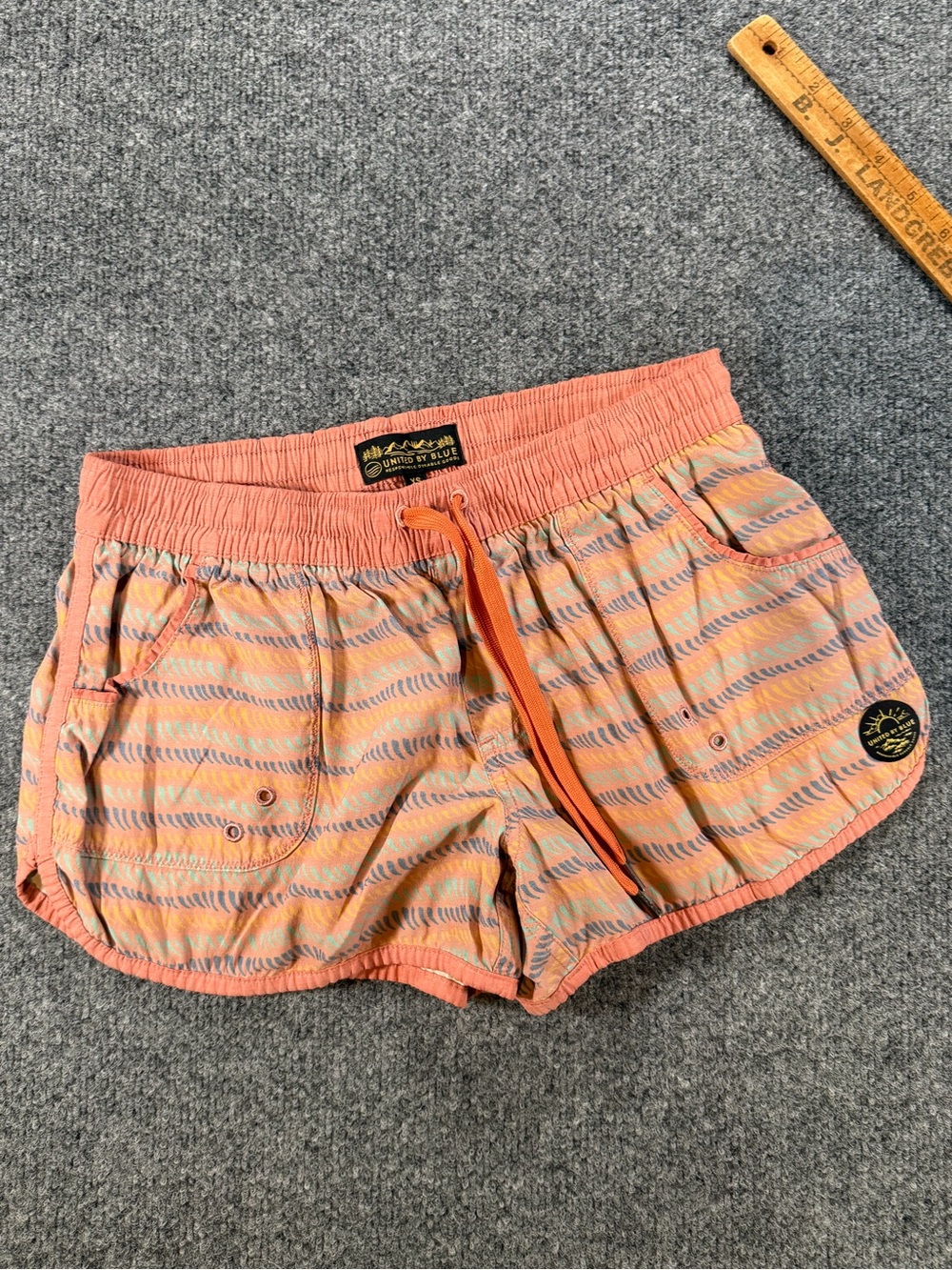United By Blue Coral Stripe Athletic Shorts